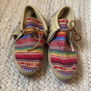 Minnetonka Moccasin bootie with fringe and fabric